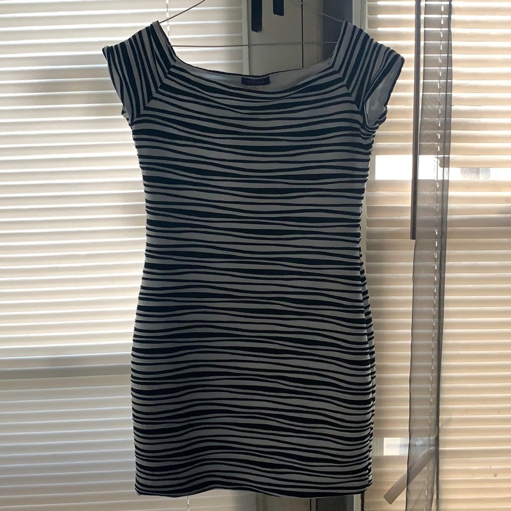 Black and white tight fitting dress.